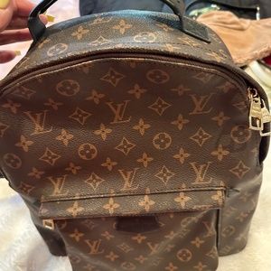 LV non authentic Backpack